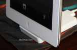 The white iPad 2 on a docking station